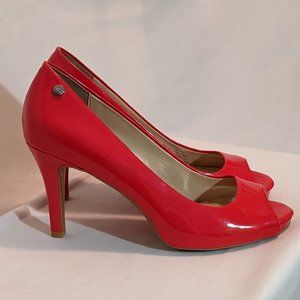 Calvin Klein red patent pumps